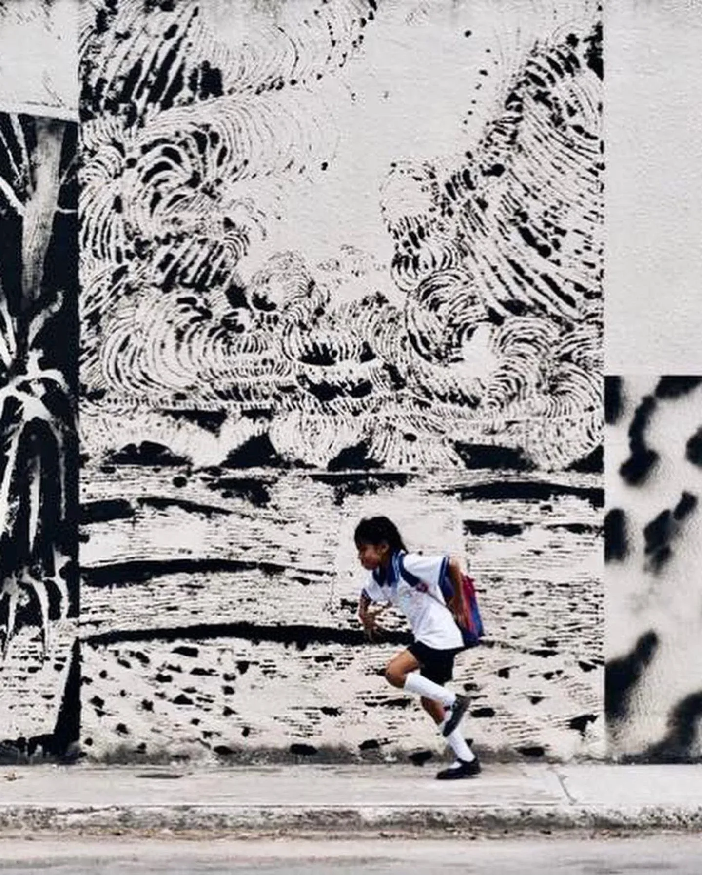 Archival photograph of a mural documented by Tulum Art Club in Tulum.